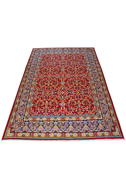 Kerman rug with red medallion design and multicolored border, rectangular