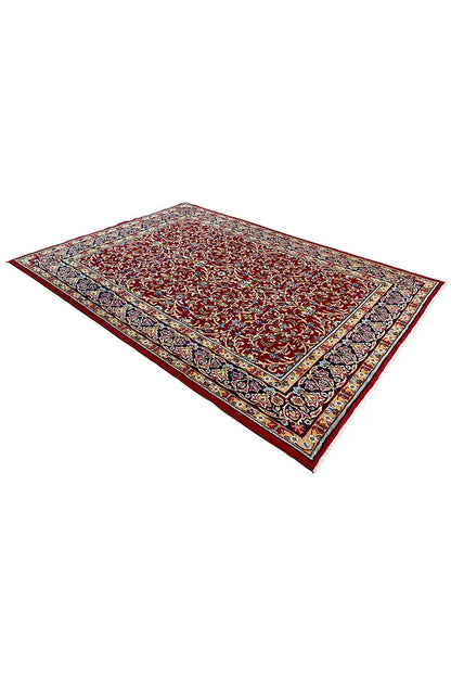 Kerman rug, red ornamental pattern with border, rectangular, angled view