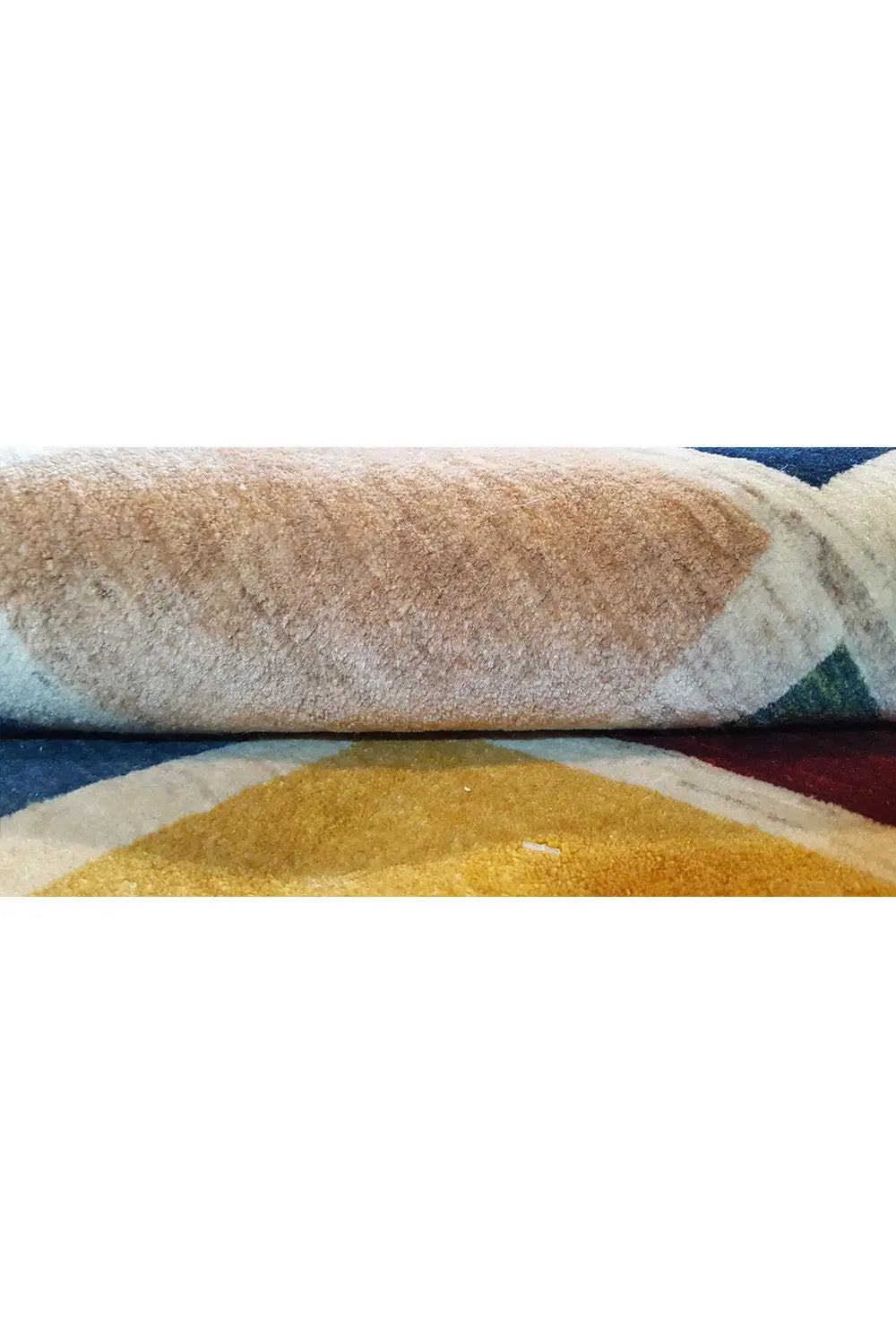 Gabbeh rug: close-up of pile and woven texture with colorful patterned areas