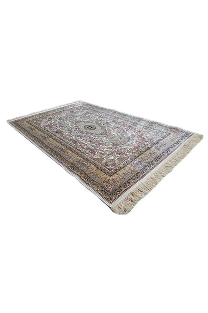 Machine-woven rug with border and medallion, 3/4 view, cream with blue
