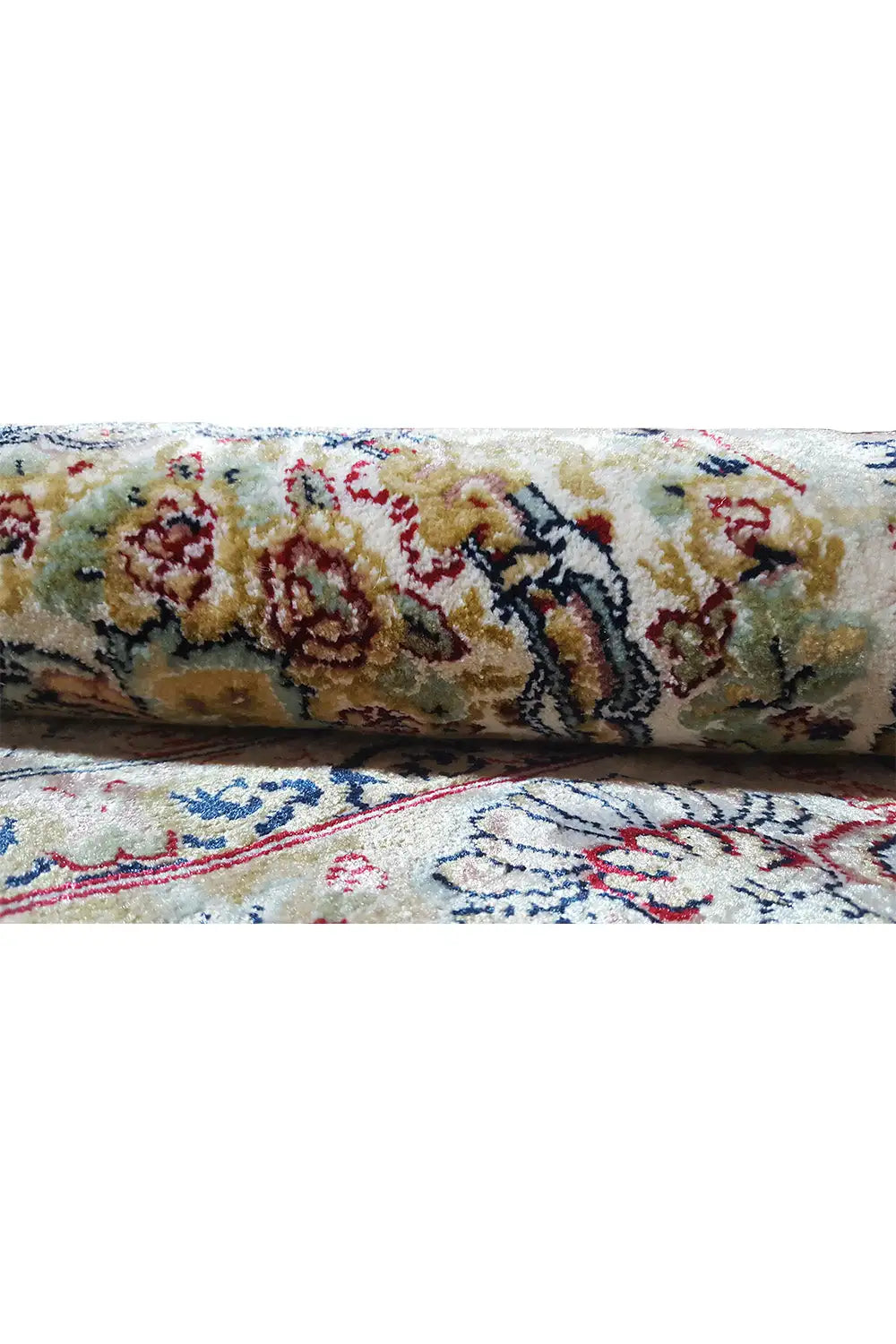 Close-up of machine-woven carpet: floral pattern, multicolored details, high pile