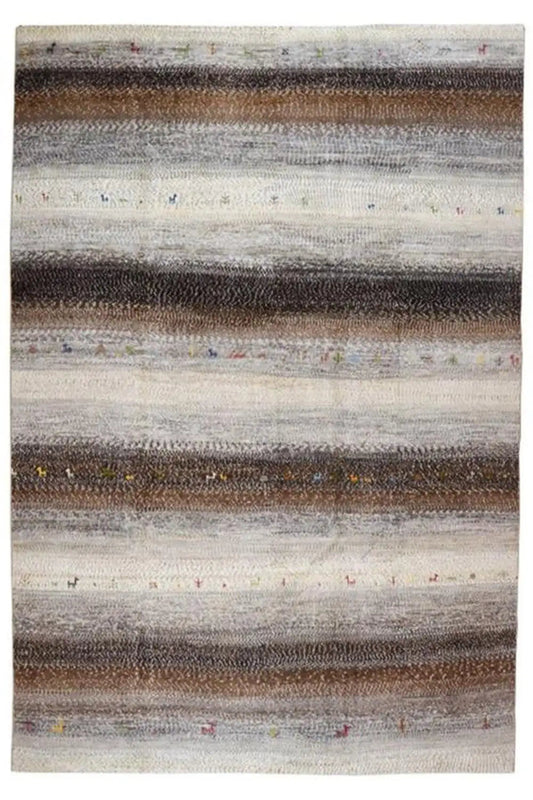 Gabbeh rug laid flat, striped in cream, gray, and brown