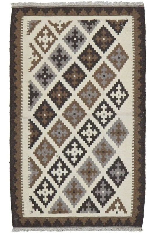 Kilim rug with a large diamond pattern and border in beige, brown, and dark gray