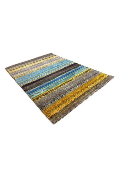 Gabbeh rug with a yellow and blue striped pattern and dark accents.