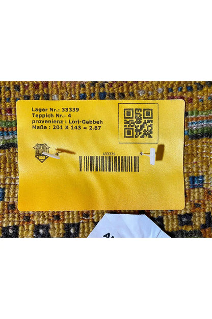 Carpet label on the back with a barcode and manufacturing details.