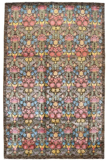 Rectangular rug with a repetitive ornamental and bird pattern, dark border