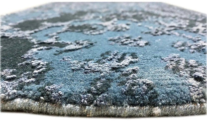 Designer rug 60x40 cm, blue pile with dark accents, close-up of the edge
