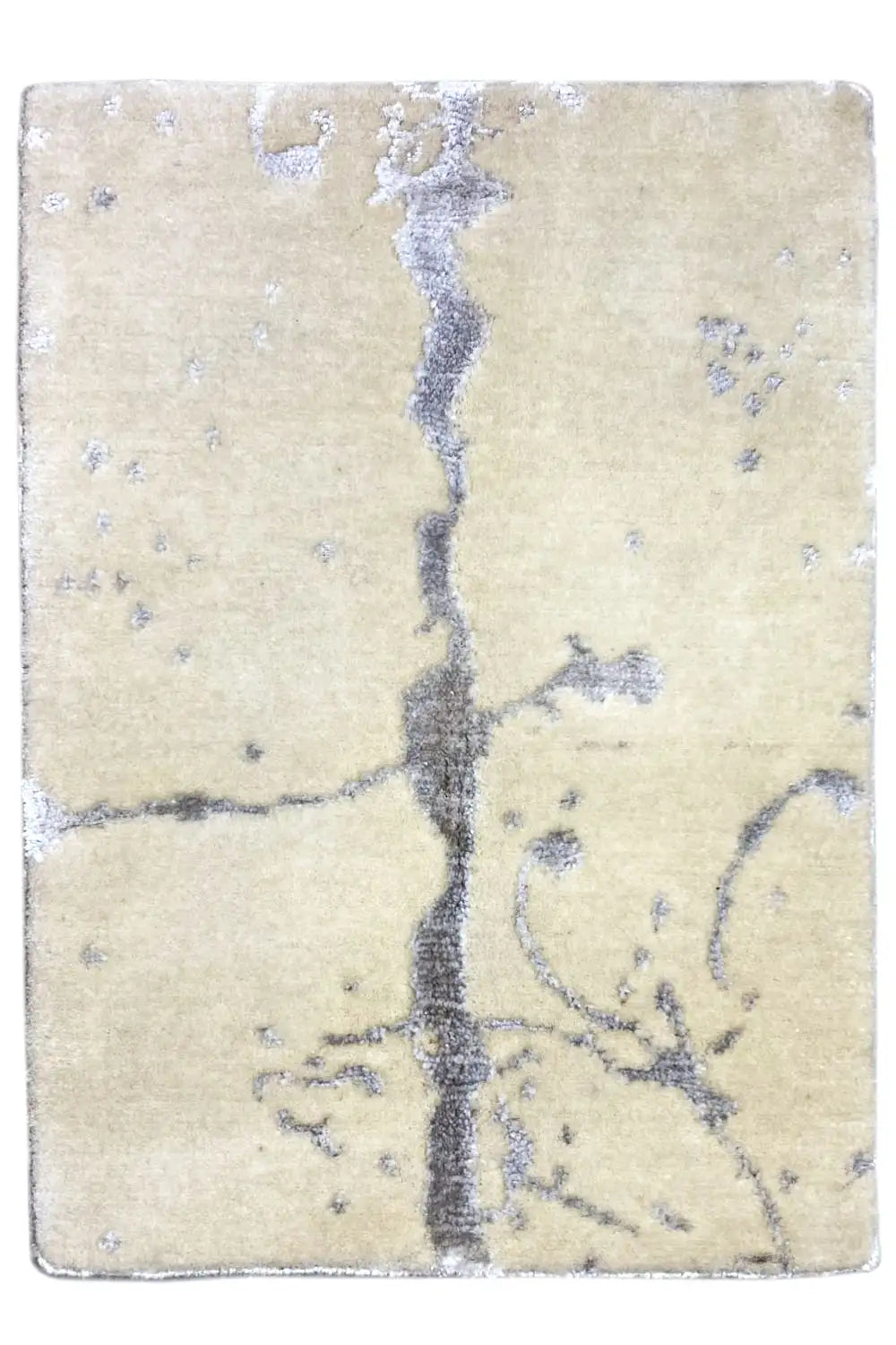 Designer rug 60x40 cm: rectangular, beige with a blue pattern and fringed edge.