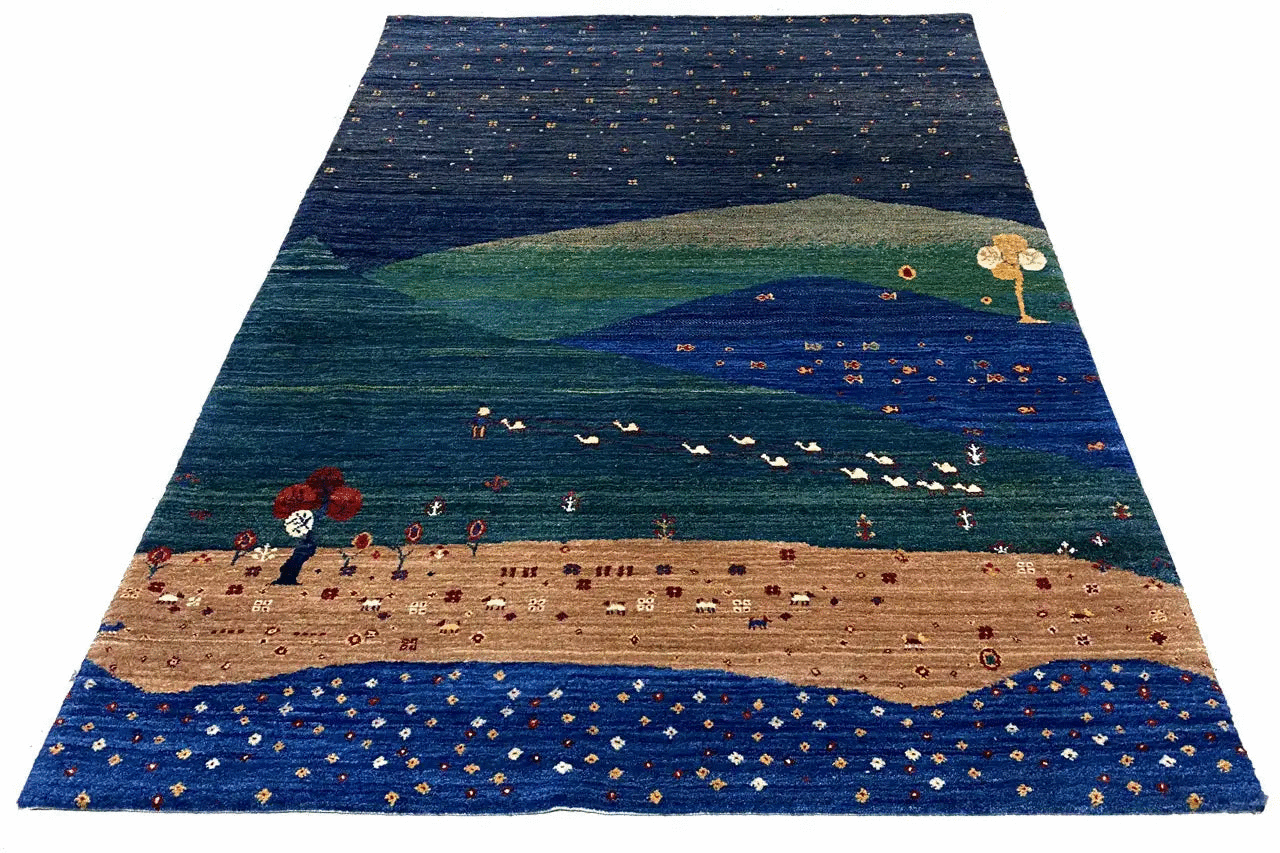 Rug with a landscape motif: dark blue, green hills and beige stripe