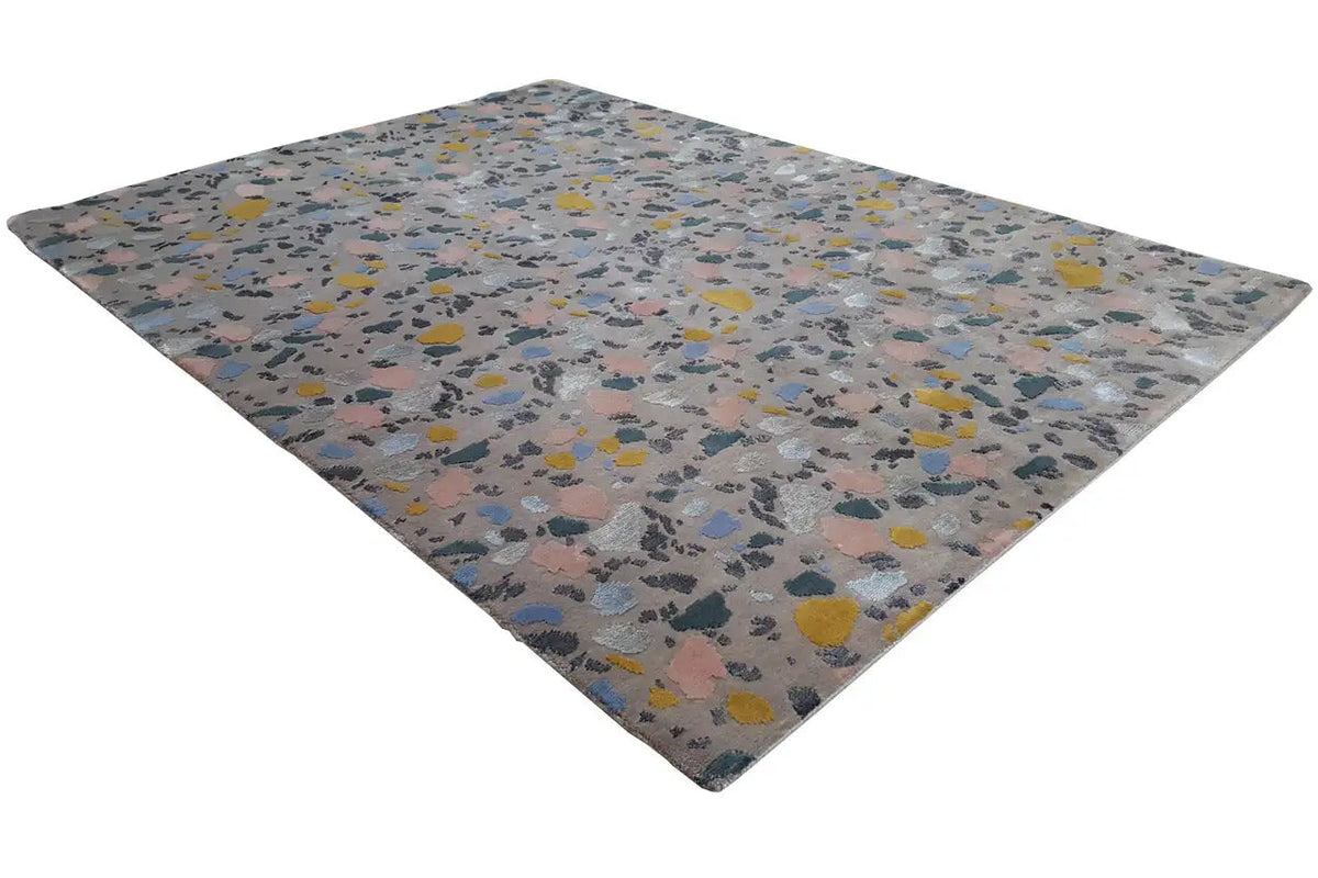 Designer rug Terrazzo by Pascal Walter, rectangular, multicolored speckled pattern