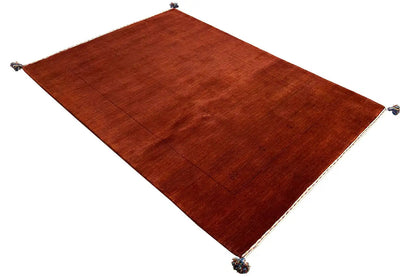 Gabbeh rug in a reddish-brown tone, rectangular, knots at the corners