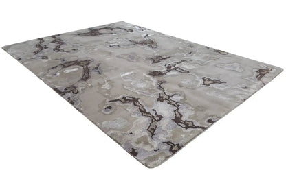 Marble-look rug, light gray with dark contours, viewed from above at an angle