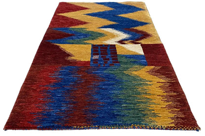Gabbeh rug, zigzag design in red, blue, yellow and green