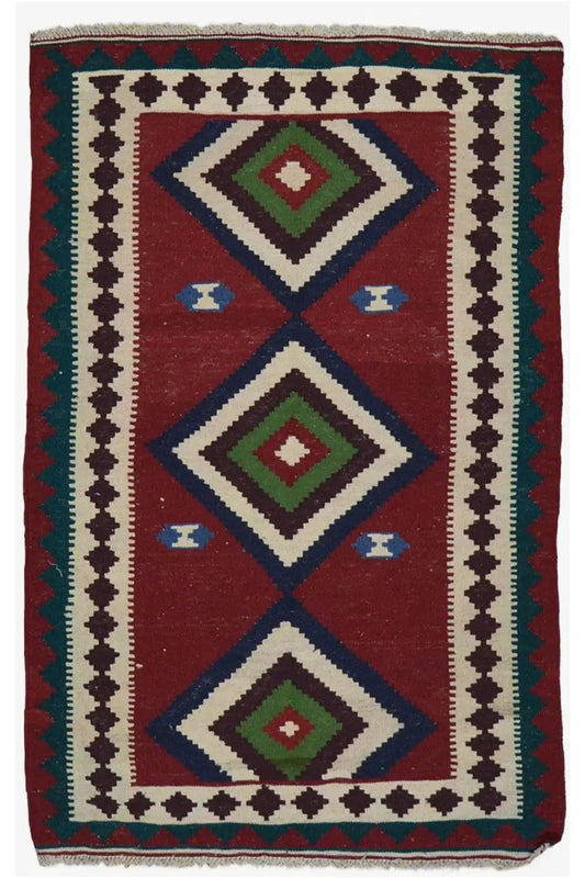 Qashqai kilim, rectangular, geometric diamond pattern in red, blue, green, and cream
