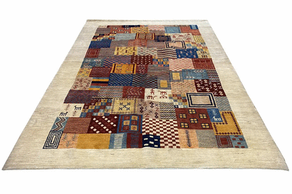 Rectangular Gabbeh rug “Lori” with a patchwork pattern in blue, brown, and beige
