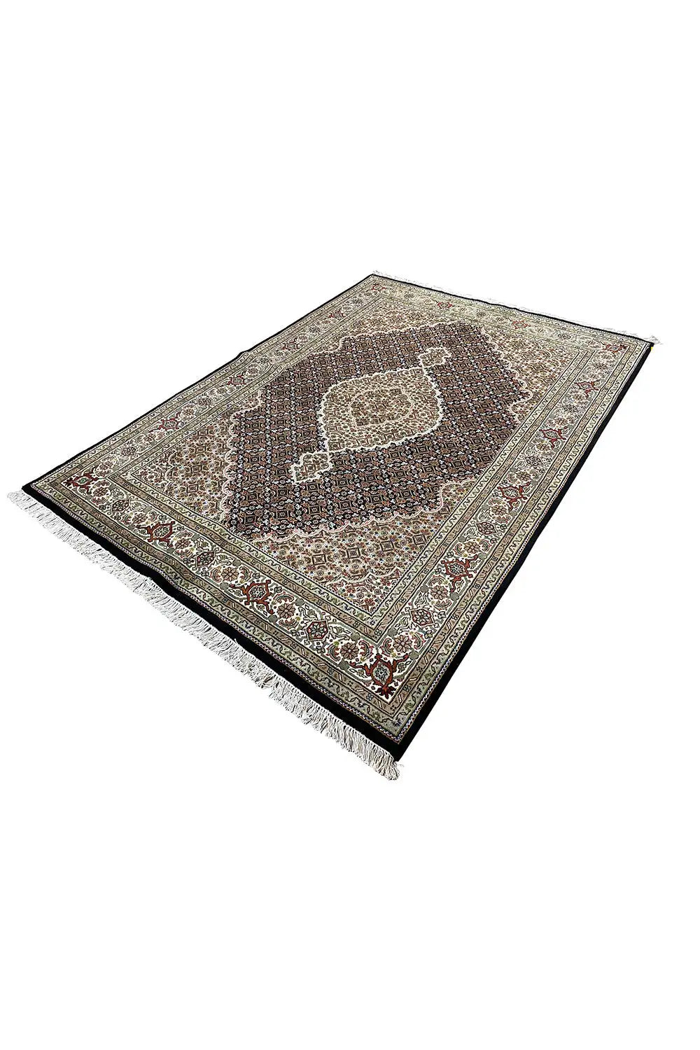 Indo Täbriz carpet at an angle, dark brown field with a light medallion and border