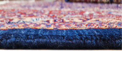 Qashqai Exklusiv rug edge: dark blue pile with a multicolored border trim