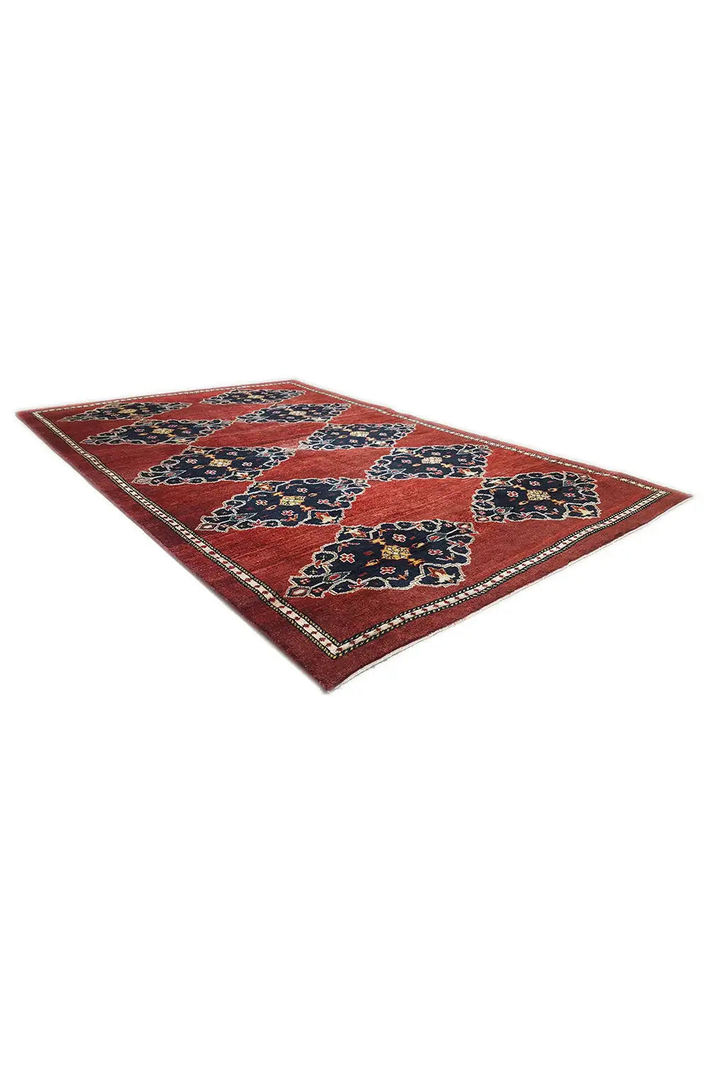 Red rug with blue and gold medallions and a narrow border, rectangular
