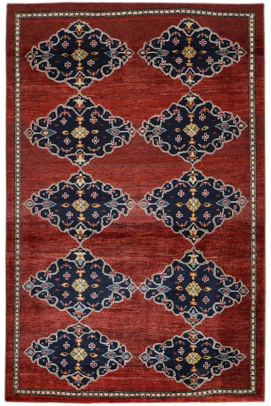 Gabbeh rug with a red ground and blue-and-white medallion motifs, rectangular