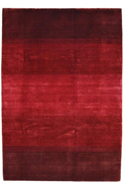 Burgundy Gabbeh rug, rectangular with a bordered edge, even pile density