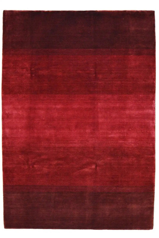 Burgundy Gabbeh rug, rectangular with a bordered edge, even pile density