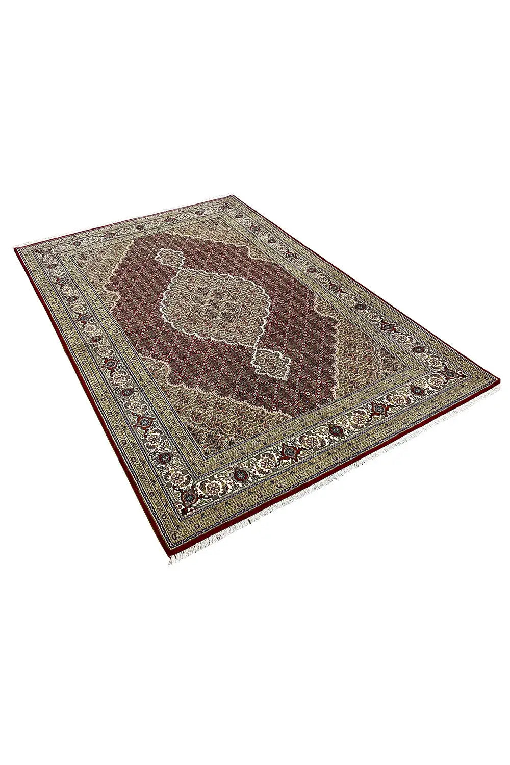 Tabriz rug, angled: red center with a beige ornamental field and dark border