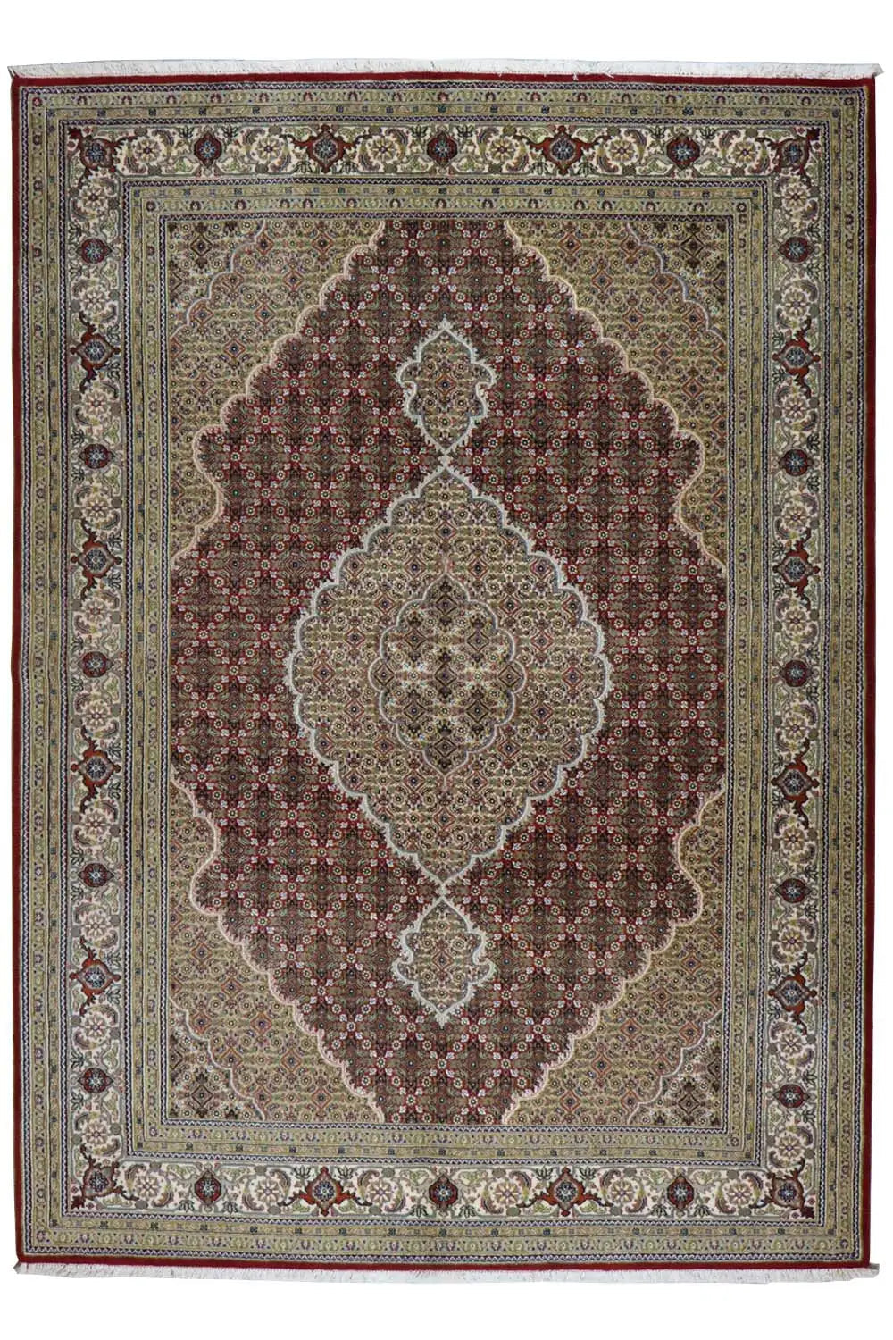 Indo Tabriz rug with central medallion, red ornamentation, and blue border