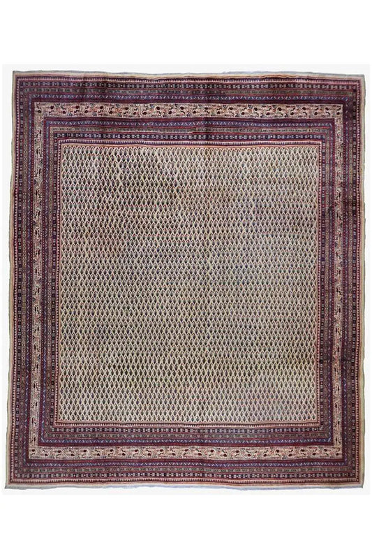 Rug with a square medallion and borders in blue, red, and beige