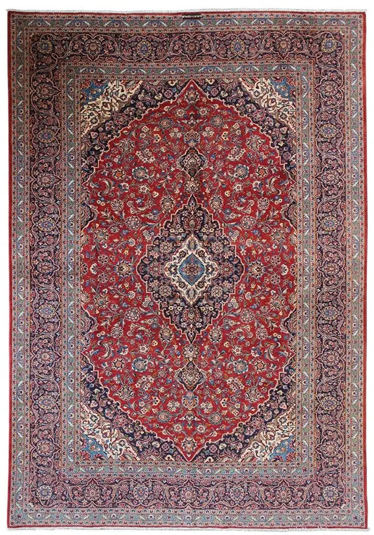 Red Keshan oriental rug with medallion pattern and blue border, rectangular