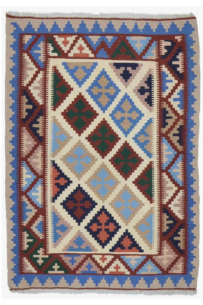 Rectangular kilim rug with a multicolored geometric pattern and fringes on the sides