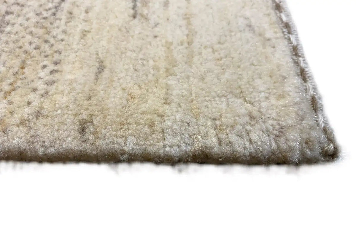 Gabbeh rug: narrow pile edge with a soft, beige surface