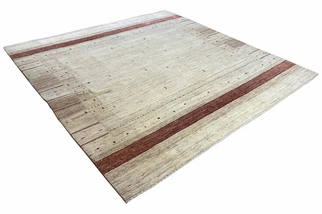 Cream gabbeh rug with a burgundy central stripe and subtle textured pattern