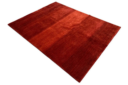 Gabbeh rug in dark red, angled, fine and even surface