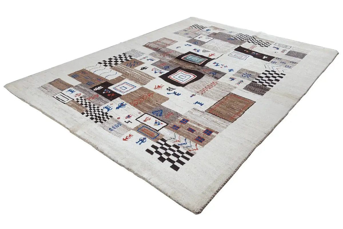 Gabbeh rug with a light background and geometric patterns, accented in blue and brown.