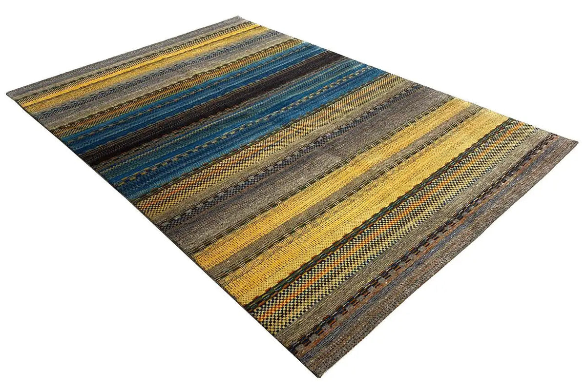 Gabbeh rug with straight stripes in blue, ochre, and gray, photographed at an angle