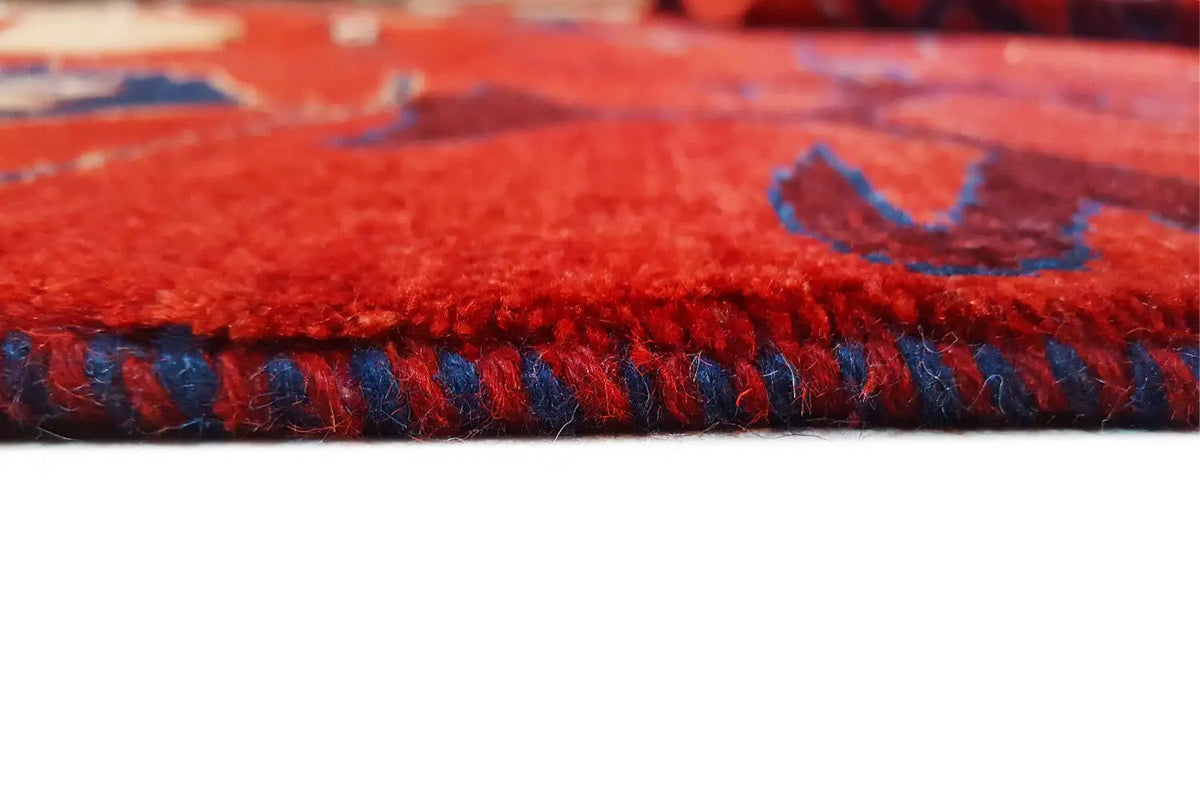 Carpet border with red pile and contrasting blue trim