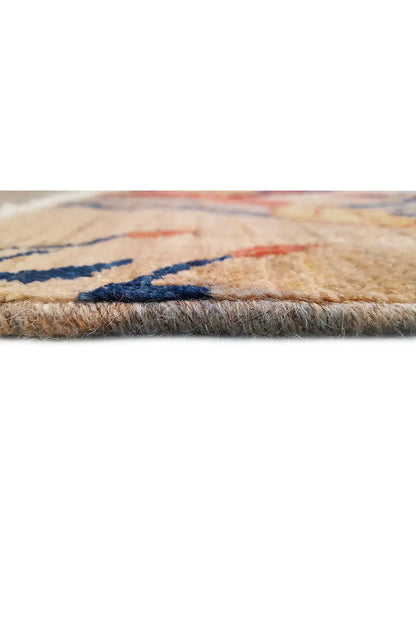 Carpet detail at the edge: dense pile with blue and red thread traces
