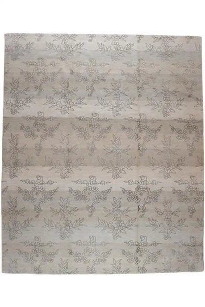 Designer rug with Bo Hamsa: light gray rug with floral line patterns, front view