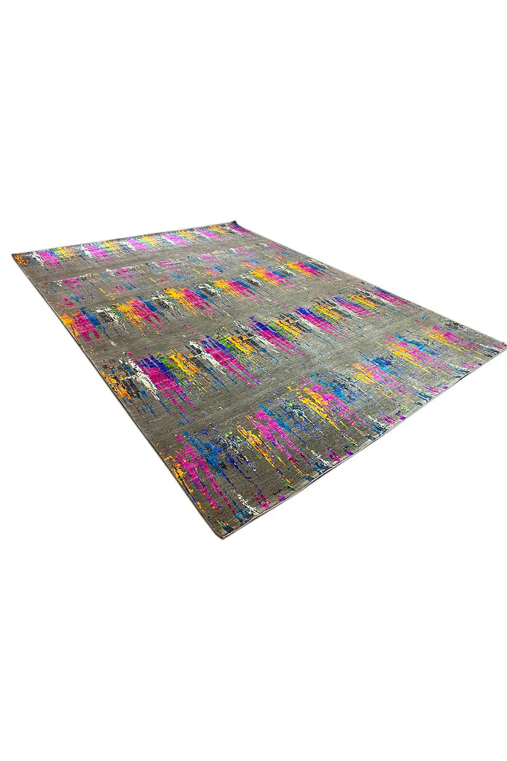 Designer rug in an oblique view with colorful accents and lines on a gray background.