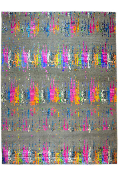 Rectangular designer rug with an abstract color-splatter pattern on a gray background, flat-woven.