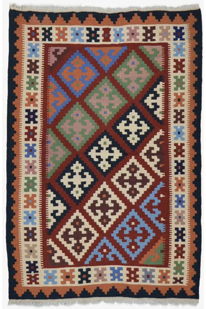Kilim rug with a multicolored diamond and cross pattern, surrounded by a border