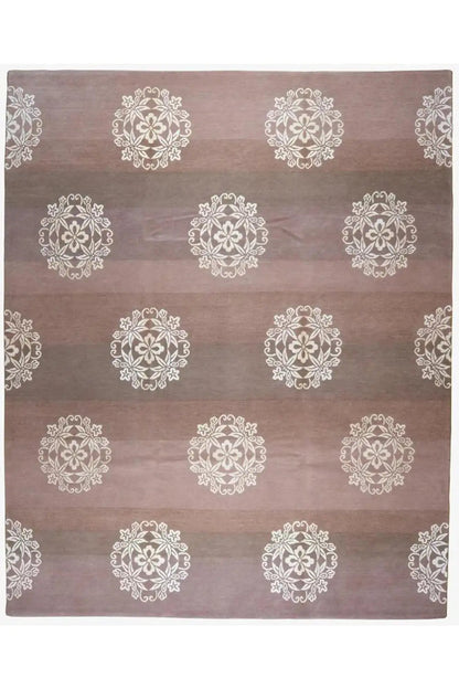 Designer rug in brown with a cream-colored mandala pattern