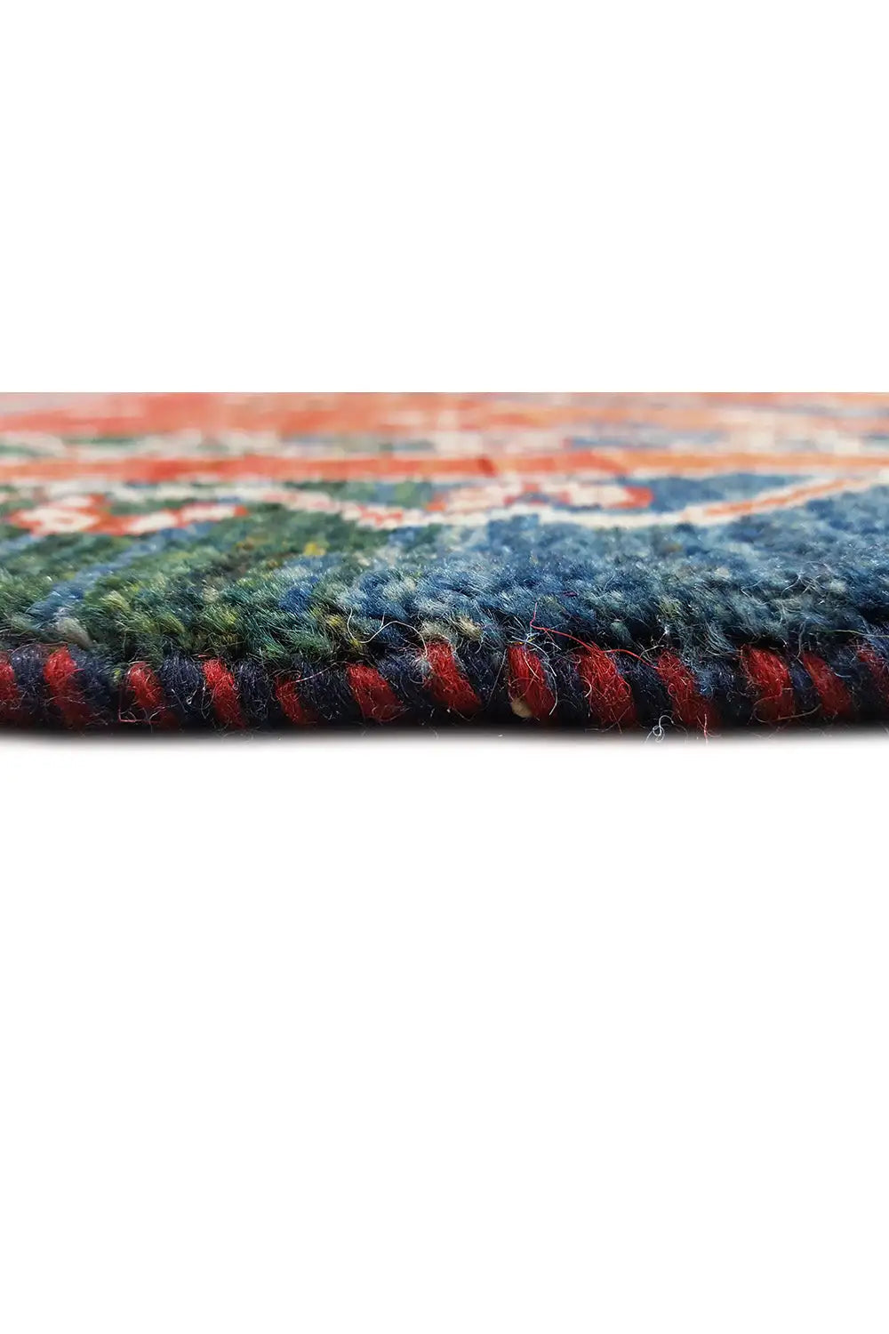 Rug with a dense pile surface, multicolored woven texture in side view
