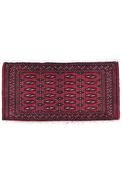 Turkmen carpet 110x51 cm, oblong, dark red with diamond patterns and a decorative border
