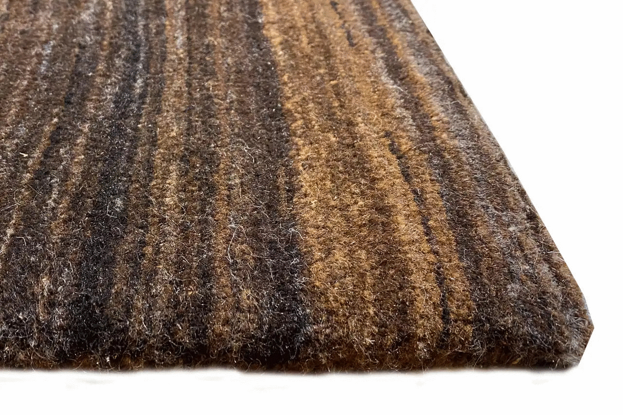 Lori Gabbeh rug: coarsely woven wool surface, mottled brown and beige