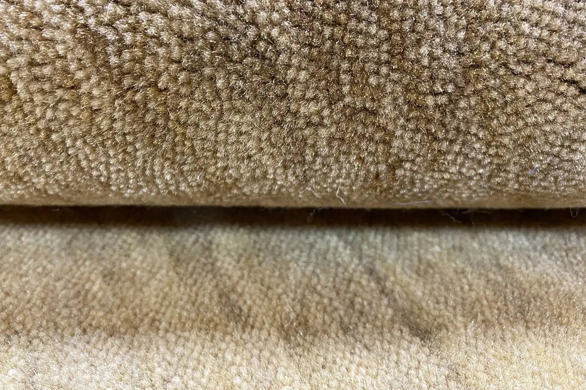 Gabbeh rug (200x139 cm) close-up: patterned pile surface, beige-brown