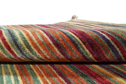 Gabbeh rug with multicolored stripes, close-up of the edge and weave pattern