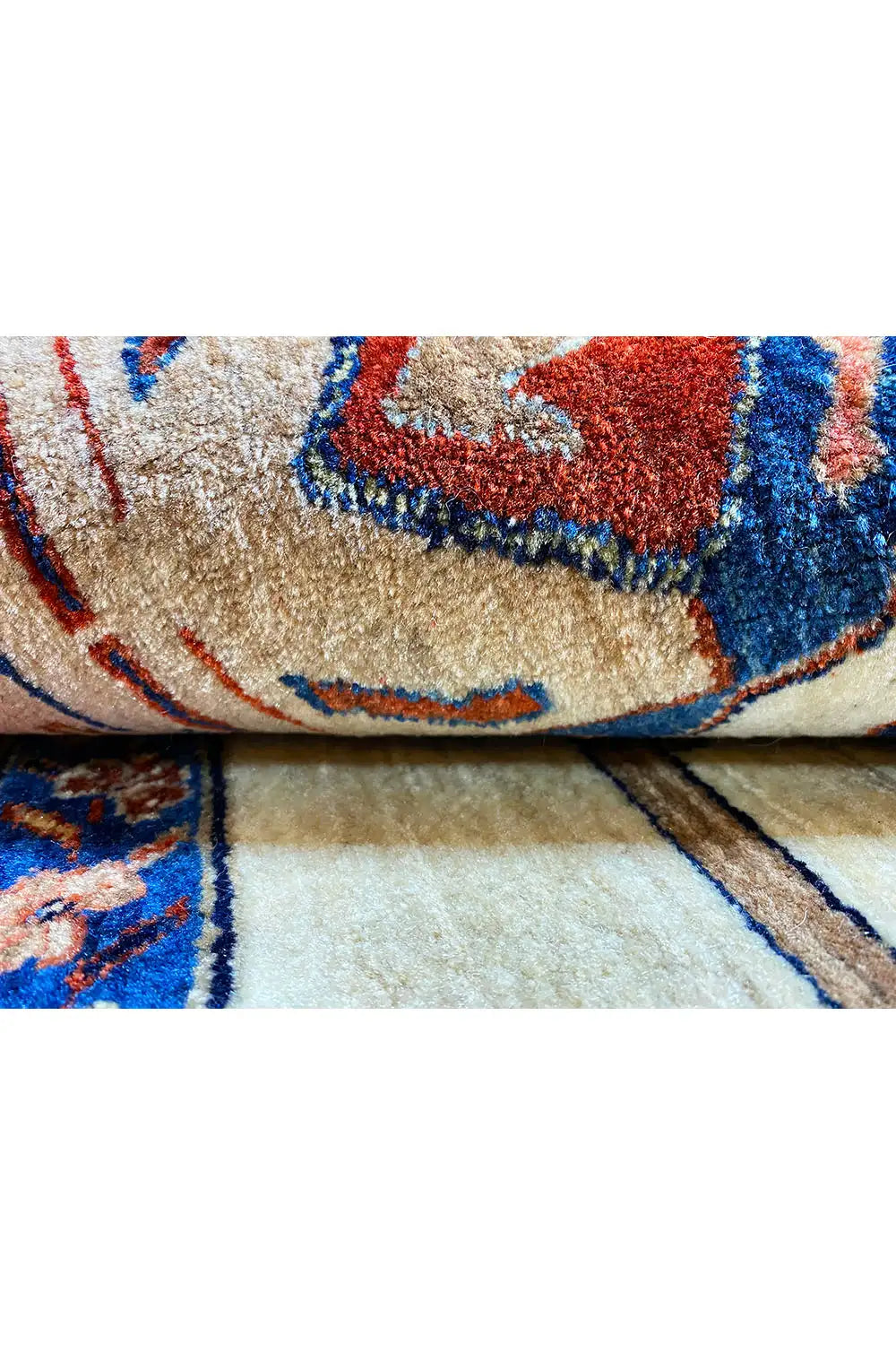 Close-up: carpet pile with a patterned area and multicolored threads