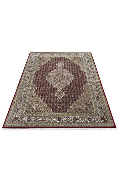 Indo Tabriz rug with central medallion and floral borders in a square format
