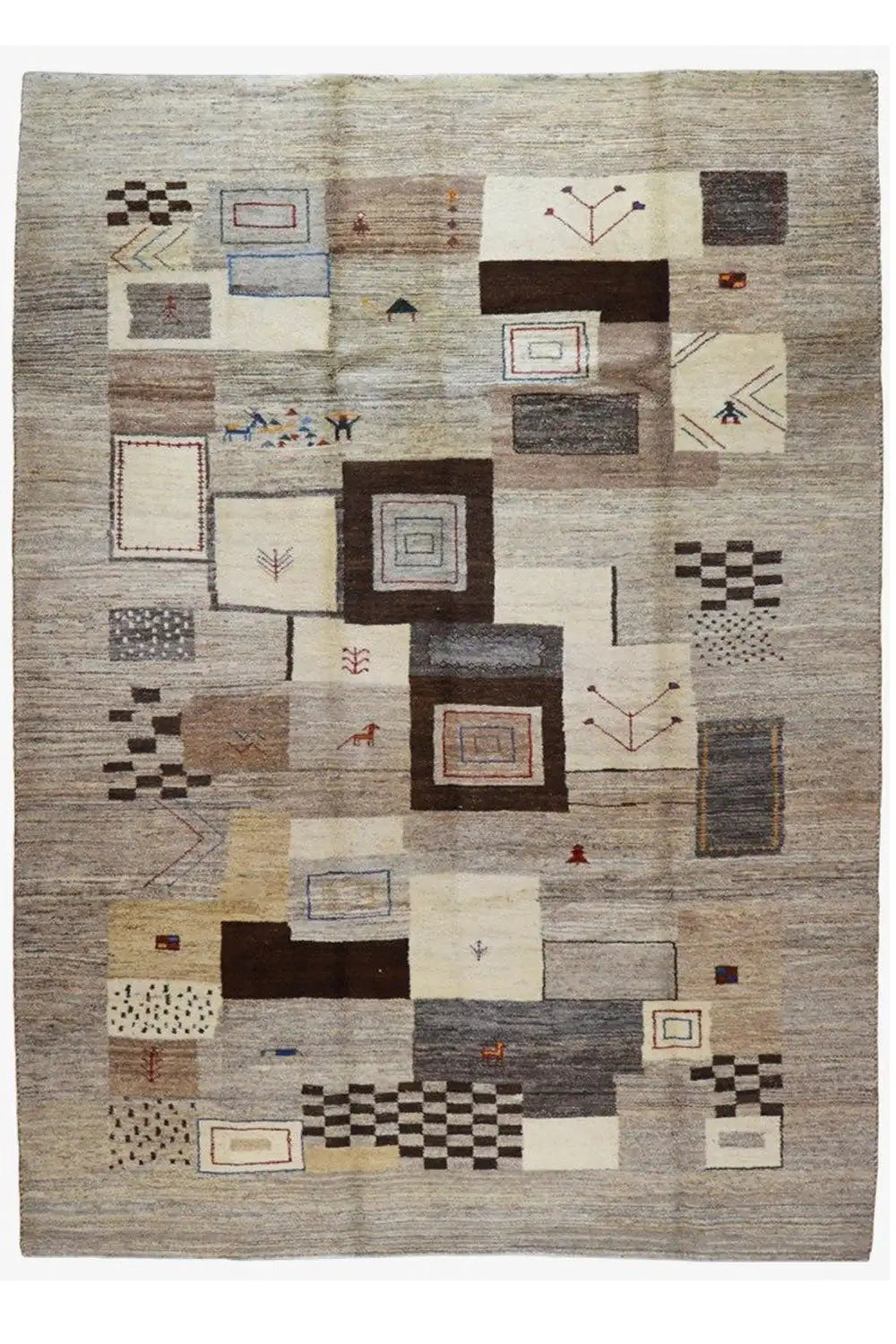 Rectangular Gabbeh rug with patchwork squares and small colorful accents